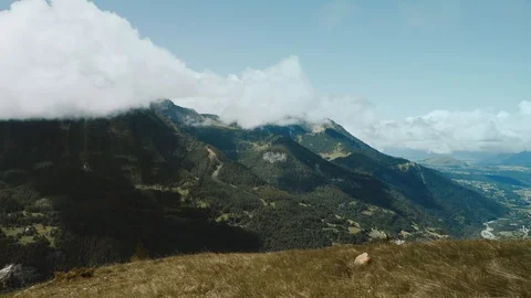 Timelapse of clouds in high Alps mountains. Beautiful alpine panorama. Stock Footage 128181875