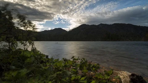 Timelapse with clouds on a lake in austria Stock Footage 87696022