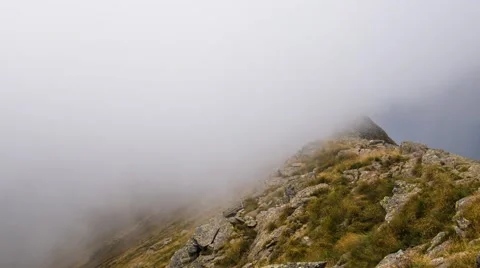 Timelapse of clouds in the mountains Stock Footage 54347739