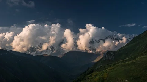 Timelapse of clouds at mountains at sunset Stock Footage 100249648