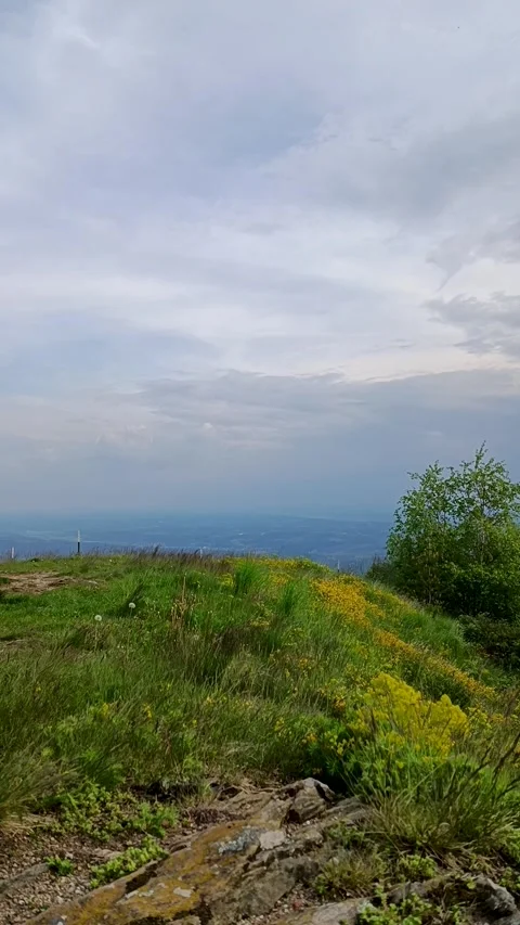 Timelapse clouds move across the sky in the mountains Stock Footage 241794393
