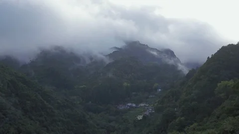 Timelapse of clouds movement over in "Ribeiro Frio", Madeira island, Portugal Stock Footage 119962315