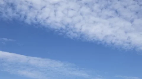 Timelapse with clouds moving 4k, moving clouds and blue sky time lapse Stock Footage 77258405