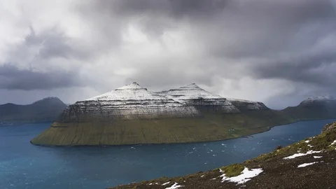 Timelapse of clouds moving above the island of Kalsoy on Faroe Island Stock Footage 110741776