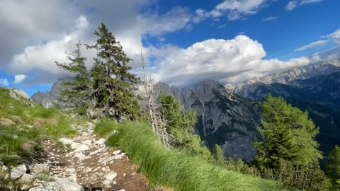 Timelapse of clouds moving above the mountains Stock Footage 196788707