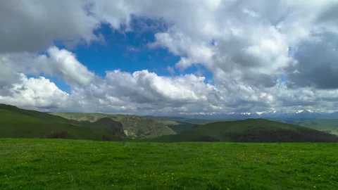 Timelapse, clouds moving across a blue sky Stock Footage 339575584