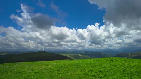 Timelapse, clouds moving across a blue sky Stock Footage 339575771