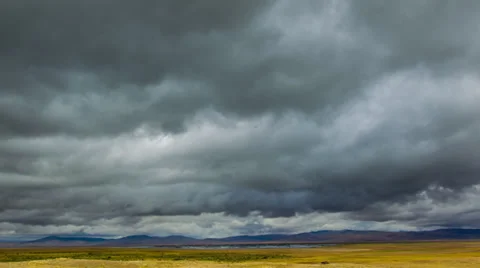 Timelapse of  clouds moving across Idaho mountains and flats Stock Footage 35062407
