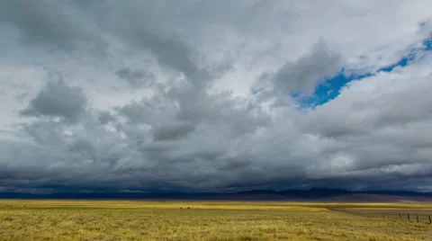 Timelapse of  clouds moving across Idaho mountains and flats Stock Footage 36299426