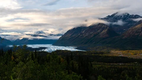 Timelapse of clouds moving across mountains next to Matanuska Glacier Stock Footage 113490414