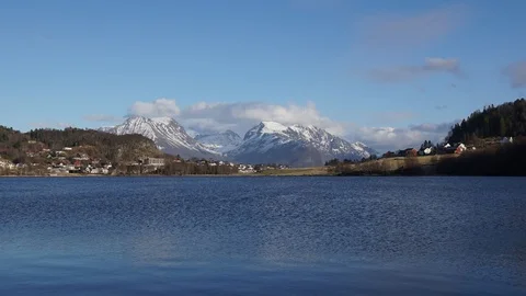 Timelapse of clouds moving around near mountain tops. Stock Footage 89946967
