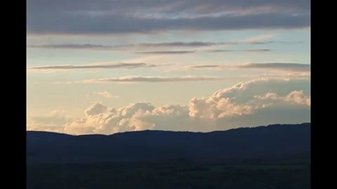 Timelapse of clouds moving behind the mountains 스톡 동영상 273692044