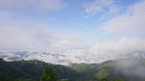 Timelapse. clouds moving between the mountains. Stock Footage 222962153