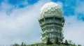 Timelapse of clouds moving in blue sky over modern space exploration laboratory 4k or 4k+ Resolution