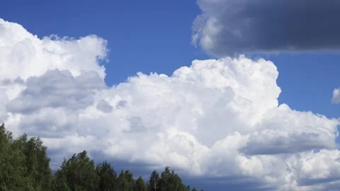 Timelapse of clouds moving in blue sky. Stock Footage 282304134