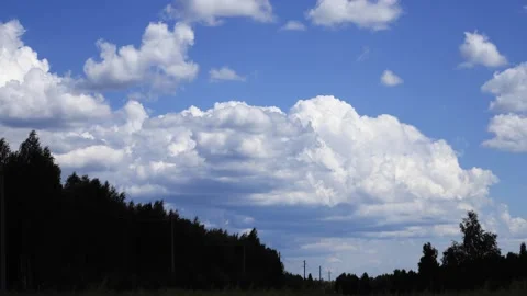 Timelapse of clouds moving in blue sky. Stock Footage 282304150