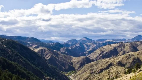 Timelapse of clouds moving at Chimney Gulch, Colorado Stock Footage 79586638