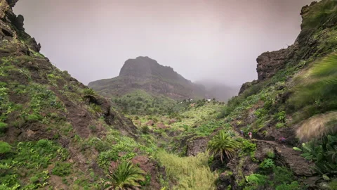 Timelapse of a clouds moving fast in the mountains volcano Teide on Tenerife Stock Footage 150907393