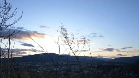 Timelapse of clouds with moving grass in foreground Stock Footage 132304343