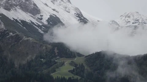 Timelapse of clouds moving in the mountains Stock-Footage 208844384
