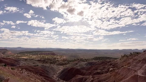 Timelapse of clouds moving over an american desert landscape in 4k Stock Footage 338098022