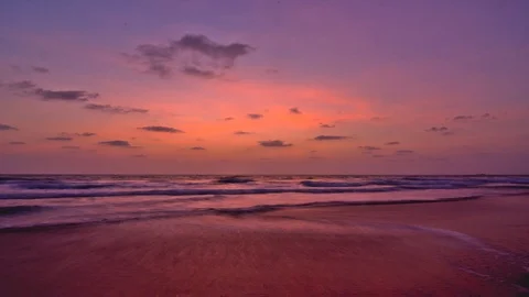 Timelapse of clouds moving over the beach during golden Hour 스톡 동영상 87318806
