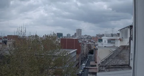 Timelapse of clouds moving over blocks of buildings in Hospitalet, Barcelona Stock Footage 127309237