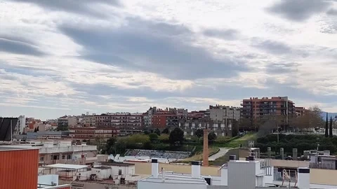 Timelapse of Clouds Moving Over City Skyline Video stock 331673816