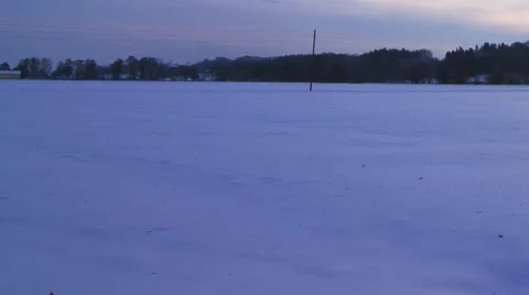 Timelapse of clouds moving over a frozen landscape Stock Footage 46544682