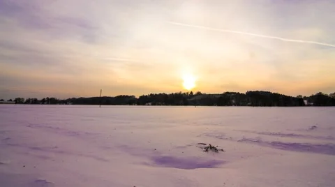 Timelapse of clouds moving over a frozen landscape Stock Footage 48983687