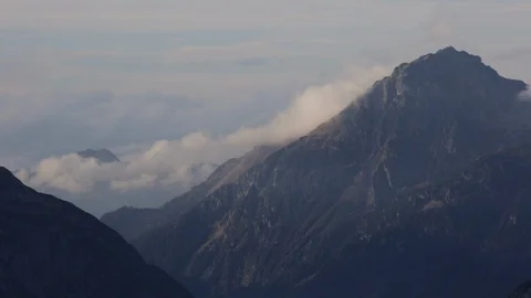 Timelapse of clouds moving over Furkapass mountain Alpine range 库存影片 123403516