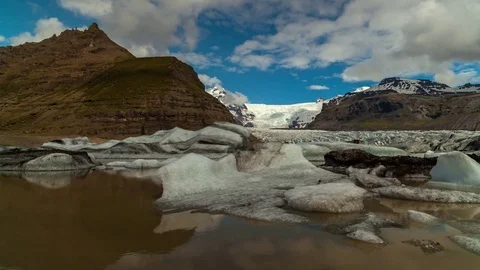 Timelapse of clouds moving over Glacier valley Stock Footage 73011180