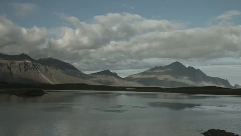 Timelapse Of Clouds Moving Over lake water on ICELAND #9 Stock Footage 82367384