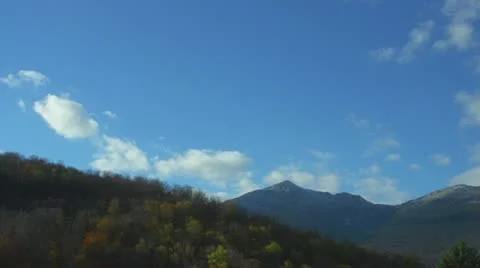 Timelapse of Clouds Moving Over Mountains 2 Stock Footage 12320303