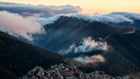 Timelapse of clouds moving over mountains, slow motion of white clouds Видео 288237670