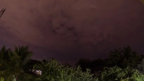 Timelapse of clouds moving over at night Stock Footage 98917399