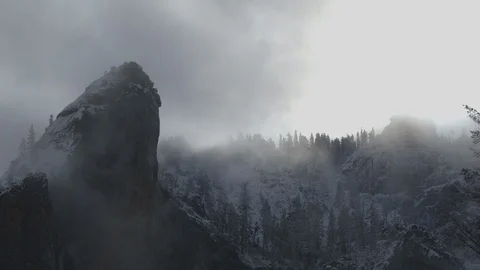 Timelapse Clouds Moving Over Snowy Rocky Crag Yosemite Stock Footage 122400777