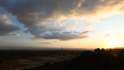 Timelapse clouds moving over sunset 動画素材 151922684