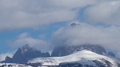 Timelapse of clouds moving over the Teton mountain range in Wyoming and Idaho Stock Footage 36309273