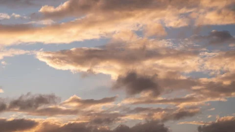 Timelapse on clouds moving through sky during a dramatic and beautiful sunset Stock Footage 271265285