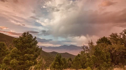 Timelapse of Clouds Moving Through Valley at Sunset Stock Footage 66319371