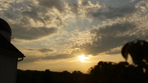 Timelapse of Clouds Moving While Sun Sets Stock Footage 161448916