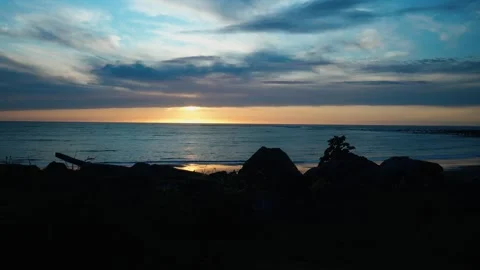 Timelapse of clouds moving while sun goes down Stock Footage 260370131