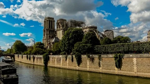 Timelapse of clouds on Notre-Dame de Paris  cathedral Stock Footage 107996925