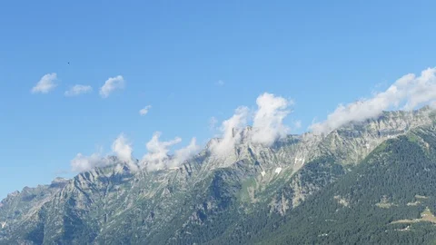 Timelapse of clouds over alpine peaks Stock-Footage 123898903