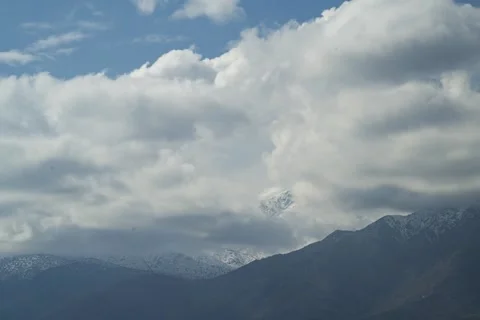 Timelapse of clouds over the Andes Mountains in Santiago, Chile. Stock Footage 345669946
