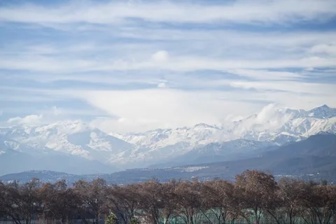 Timelapse of clouds over the Andes Mountains in Santiago, Chile. Stock Footage 345669971