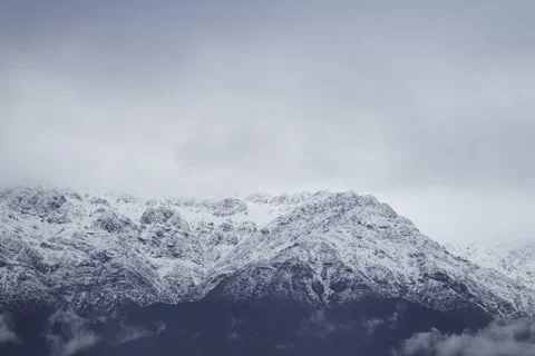 Timelapse of clouds over the Andes Mountains in Santiago, Chile. Stock Footage 345670167