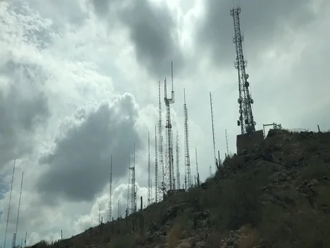 Timelapse Of Clouds Over Antenna On Mountain Video stock 78041644
