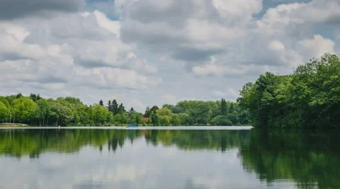 Timelapse of clouds over a beautiful lake in France (4k) Stock Footage 65403698